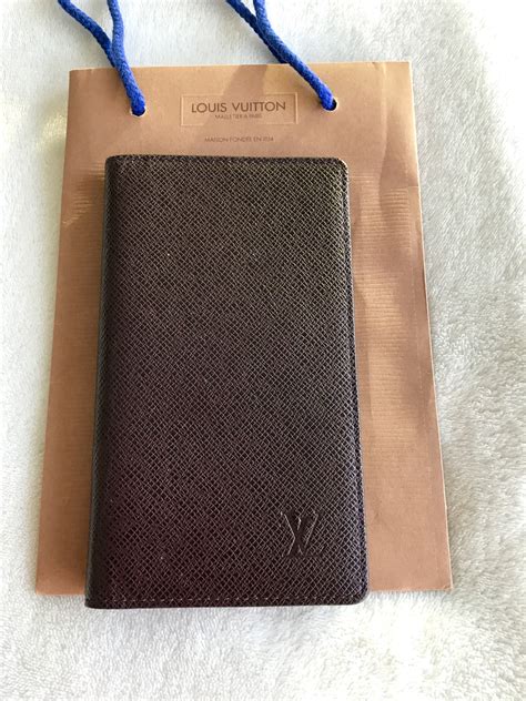 louis vuitton taiga wallet replica|louis vuitton counterfeit id.